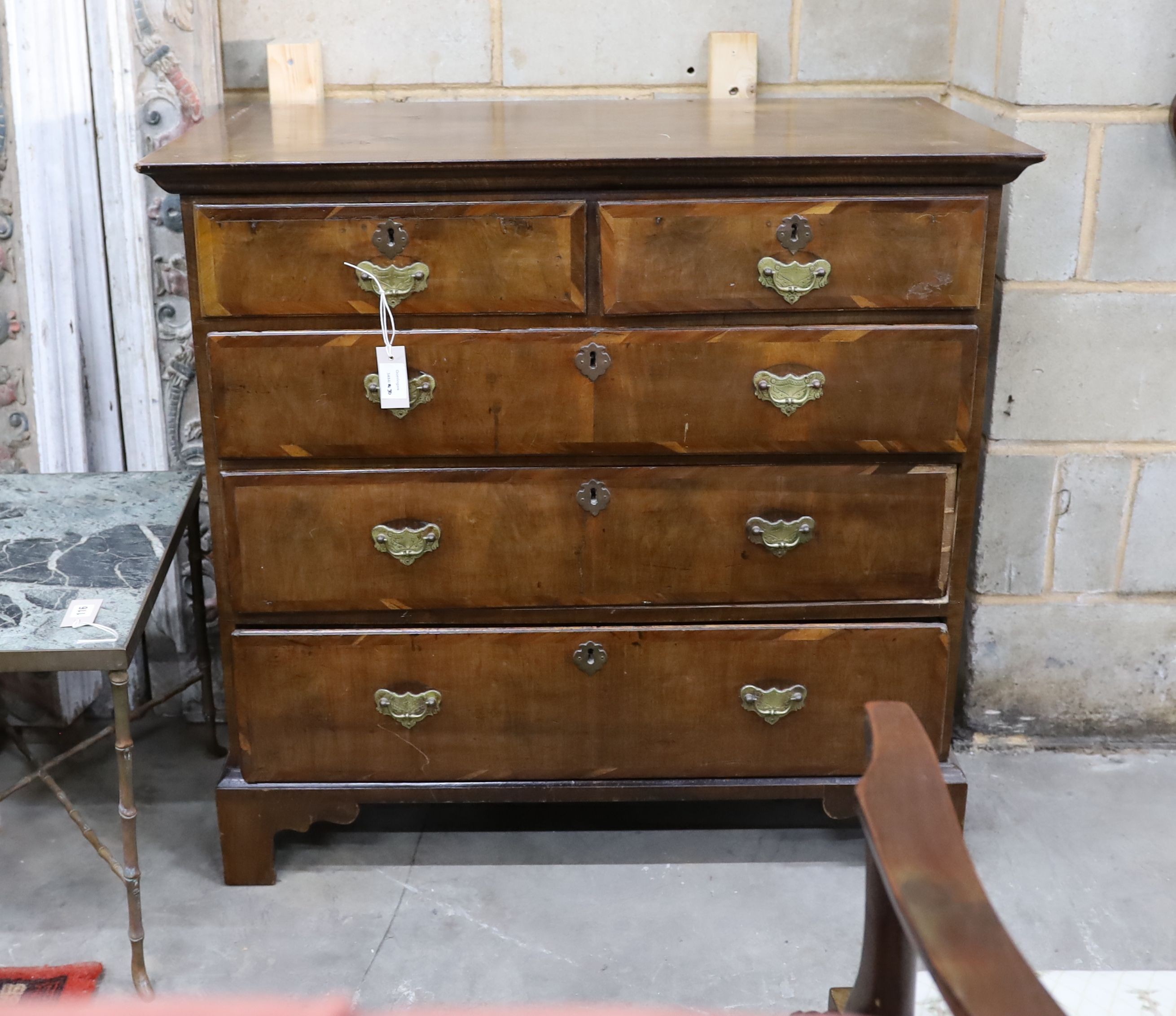 An 18th century and later banded walnut chest of drawers, width 99cm, depth 52cm, height 94cm